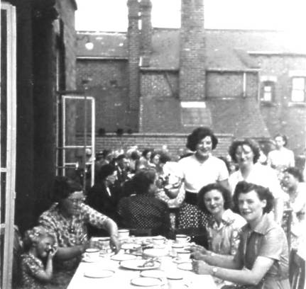 Joan & Mollie serving tea to Mum, sister Margaret, Kathleen & Mrs Illingworth